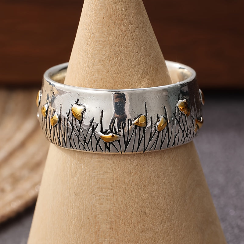 Zilveren vintage ring met gouden vogels en bladeren