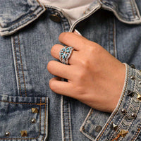 Zilveren ring met turquoise blaadjes en zirkonia