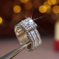 Zilveren halo ring met prinses geslepen zirkonia
