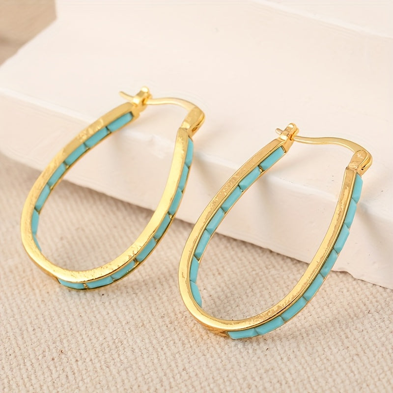 Gouden ovale oorbellen met turquoise