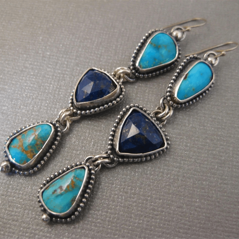 Zilveren oorbellen met turquoise en lapis druppels