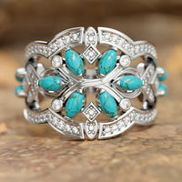 Zilveren brede ring met marquise turkoois en zirkonia