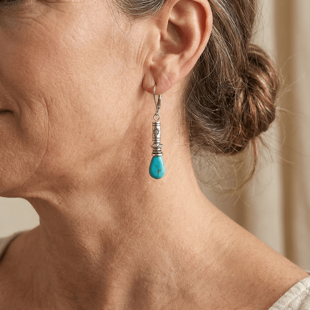 Zilveren etnische oorbellen met turquoise druppel