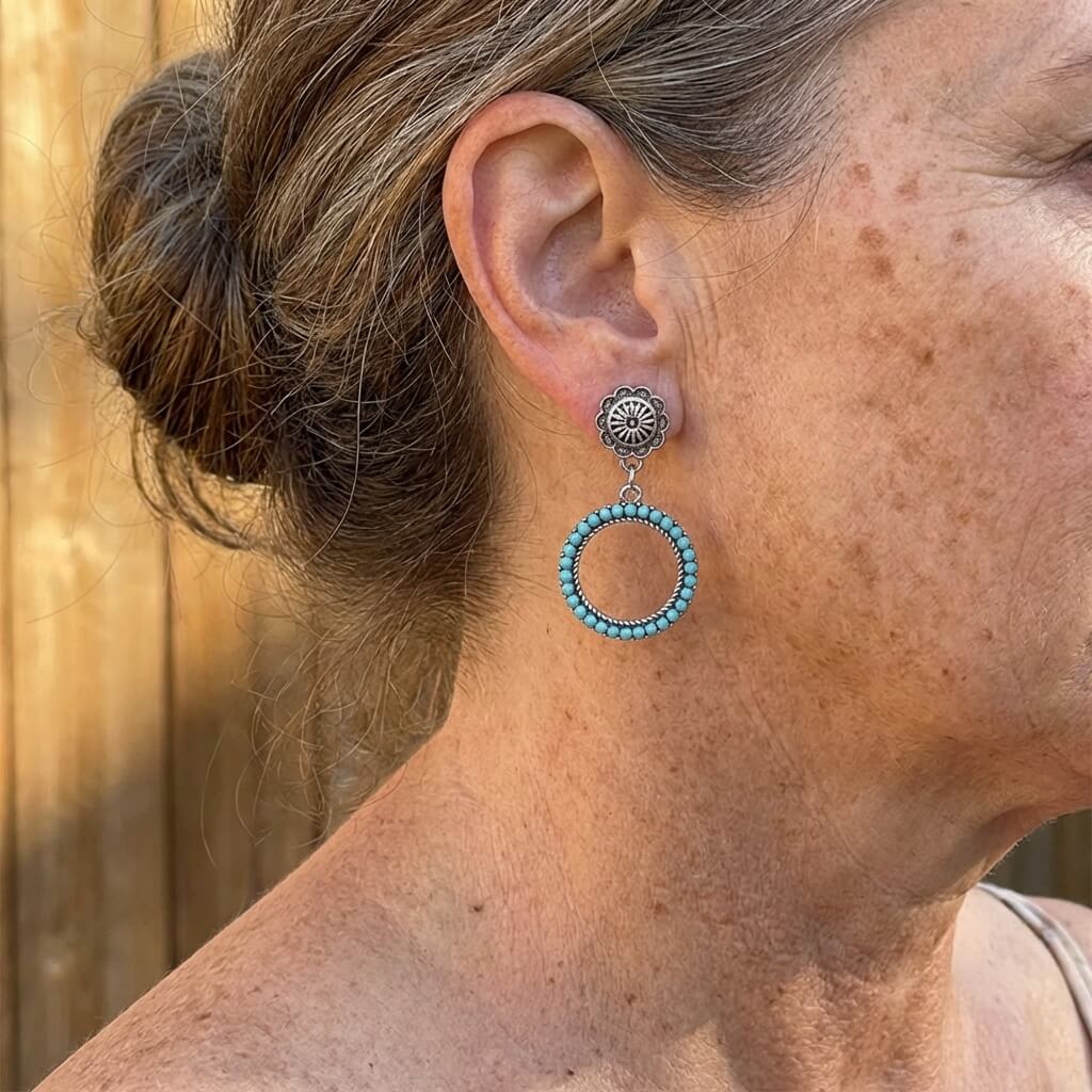 Zilveren vintage oorbellen met turquoise kralenring