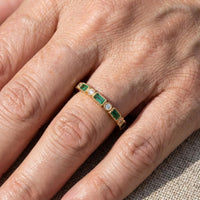 Gouden ring met groene en heldere zirkonia