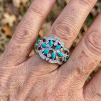 Zilveren statement ring met turquoise en kristal