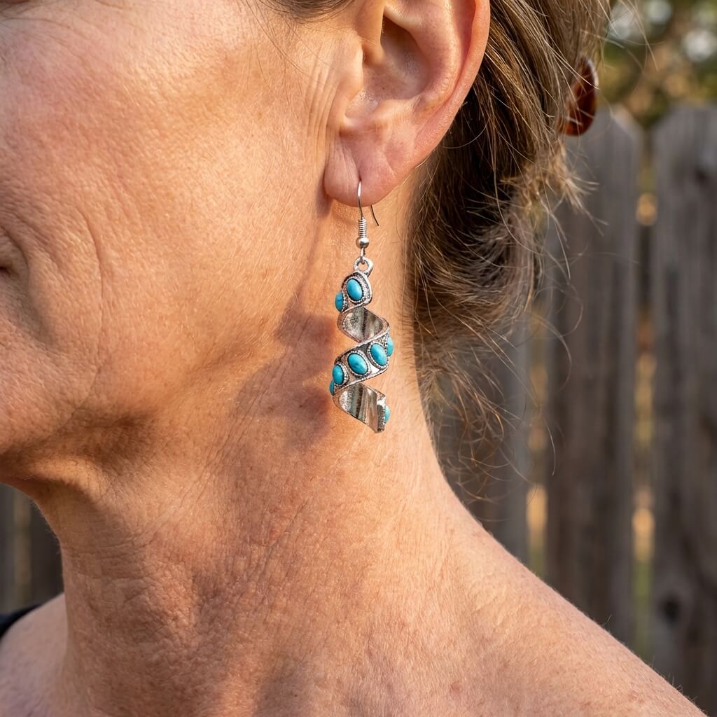 Zilveren oorbellen met spiraal en turquoise
