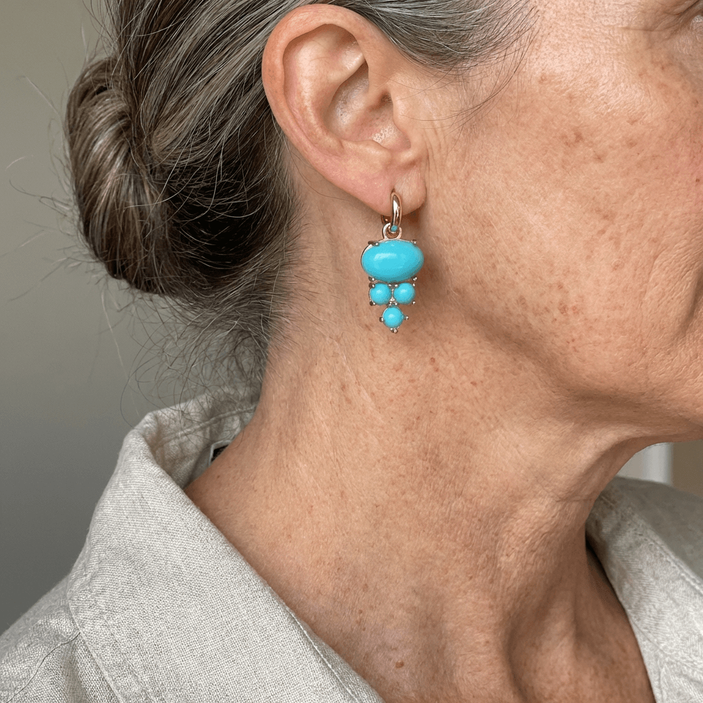 Gouden oorbellen met ovale turquoise en kraaltjes