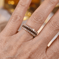 Roségouden eternity ring met zwarte en witte zirkonia