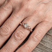 Zilveren gevlochten infinity-ring met heldere steen