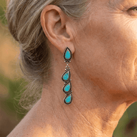 Zilveren bohemian oorbellen met turquoise druppels