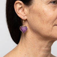 Paarse glitter oorbellen met hart