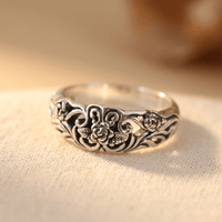 Zilveren vintage ring met opengewerkt bloemmotief