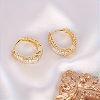 Gouden ovale oorbellen met zirconia pavé