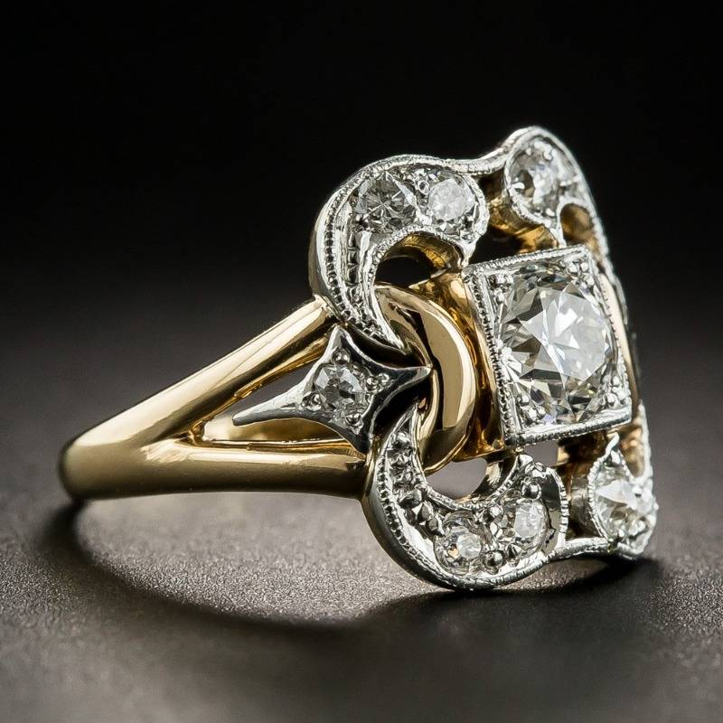 Antieke ring met diamant in goud en zilver