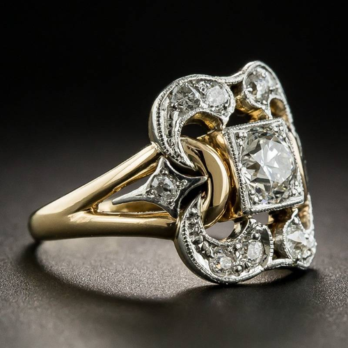 Antieke ring met diamant in goud en zilver
