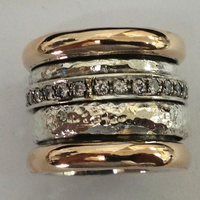 Brede ring in goud en zilver met zirkonia