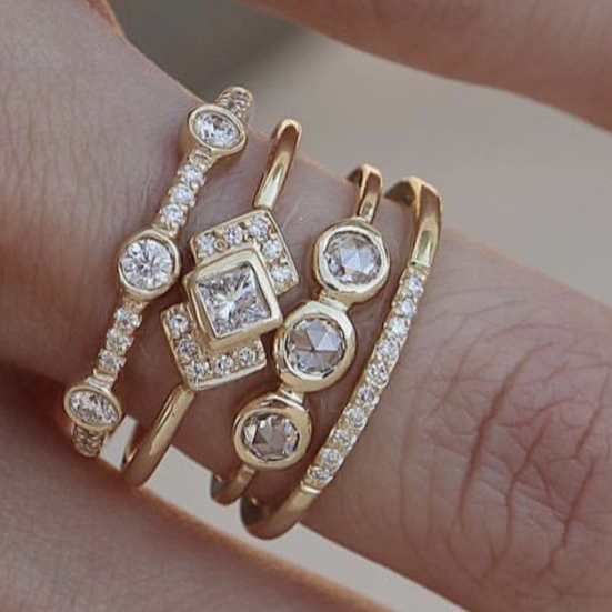 Gouden ringenset in art-decostijl met kristallen