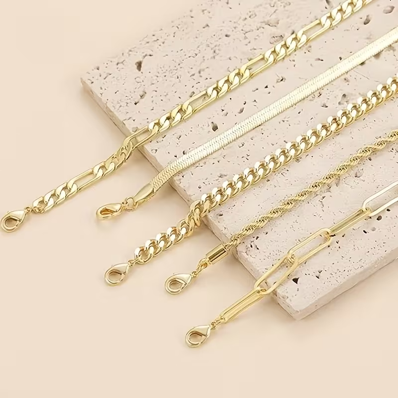 Gouden gelaagde armbandenset met schakels