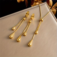 Gouden gelaagde schakelarmbanden set