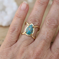 Gouden ring met druppelvormig turkoois