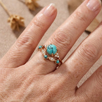 Roségoud ring met turquoise en zirkonia
