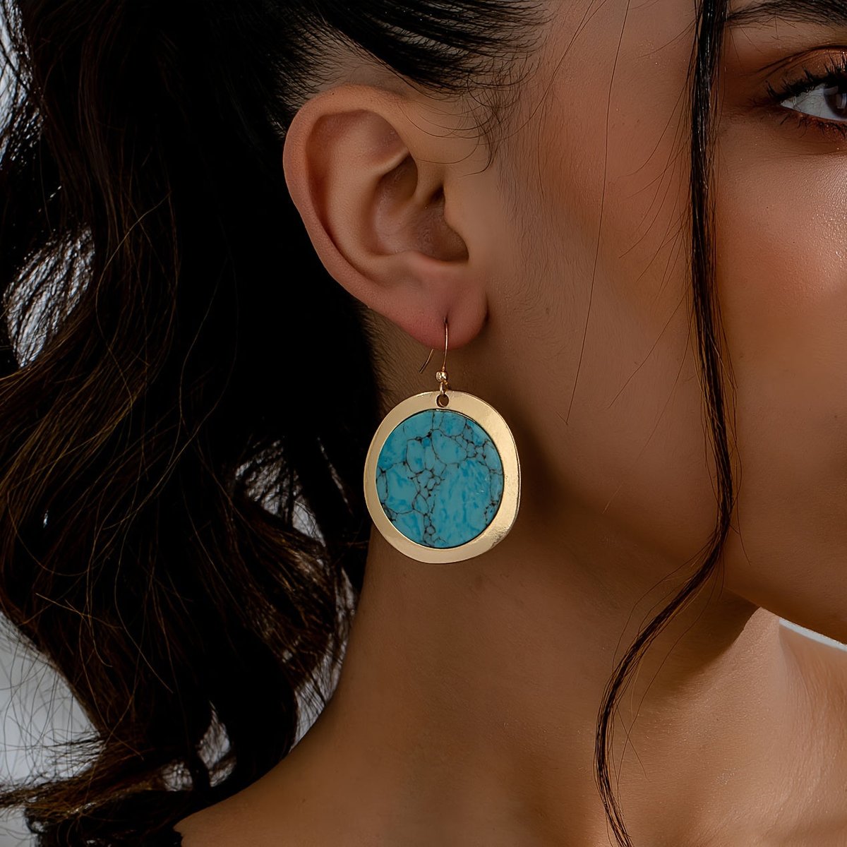 Zilveren oorbellen met ronde turquoise schijf