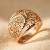 Roségouden opengewerkte ring met rankmotief