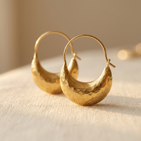 Gouden gehamerde hoop oorbellen