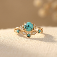 Gouden vintage ring met turquoise bloemmotief