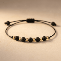 Black Lava Stone Gold Beaded Bracelet